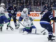 Canucks' Kevin Lankinen Shines in 3-2 Overtime Loss to Winnipeg Jets