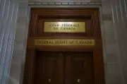 Chinese Police Officer, Wife Denied Canadian Residency Over Crimes Against Humanity