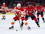 Flames' Fighting Spirit Shines Despite 7-3 Loss to Capitals on Late Goals