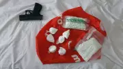 Loaded Firearm and Thousands of Pills Seized in Thunder Bay Drug Trafficking Investigation