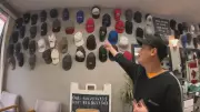 Vancouver Barber's Unique Collection: Dozens of 'Retired' Hats Adorn Shop Walls
