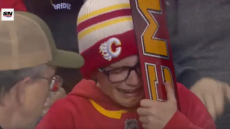 Flames Goalie Dustin Wolf Gifts Stick to Young Fan with Heartfelt Sign