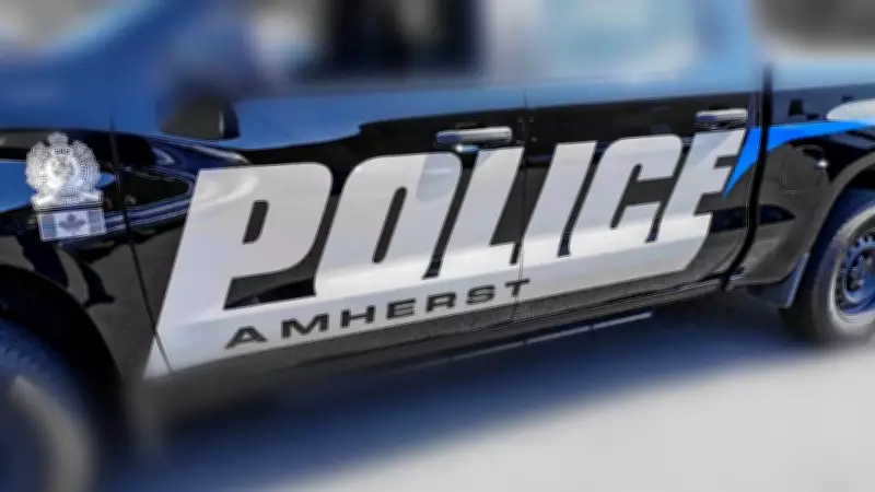 Two Charged in Amherst After Police Find Them Asleep in Vehicle with Weapons