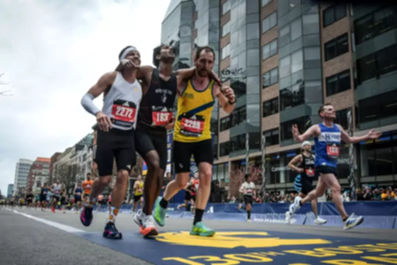 Two strangers help runner finish Boston Marathon in heartwarming act