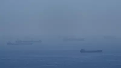 Iran Fires on Container Ship in Strait of Hormuz Amid Ceasefire Tensions