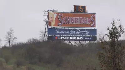 Schneiders Sign in Wellington County Damaged by Severe Storm