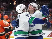 Canucks' Curtis Douglas Elevates Team Spirit with Grit and Gregarious Presence