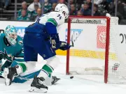 Canucks Edge Sharks in Thrilling 4-3 Shootout Victory Despite Defensive Lapses