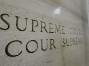 Ex-N.L. premier says Carney government acting unconstitutionally over charter clause