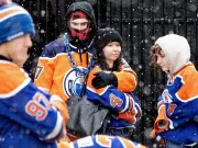 Spring Blizzard Won't Stop Oilers Fans from ICE District Festivities