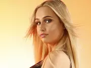 SUNshine Girl Sunny Aspires to Own a Red Corvette and Embrace Beach Life