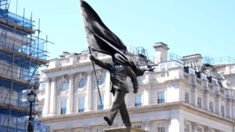 Banksy Confirms New Sculpture of Flag-Bearing Man Near London Mall