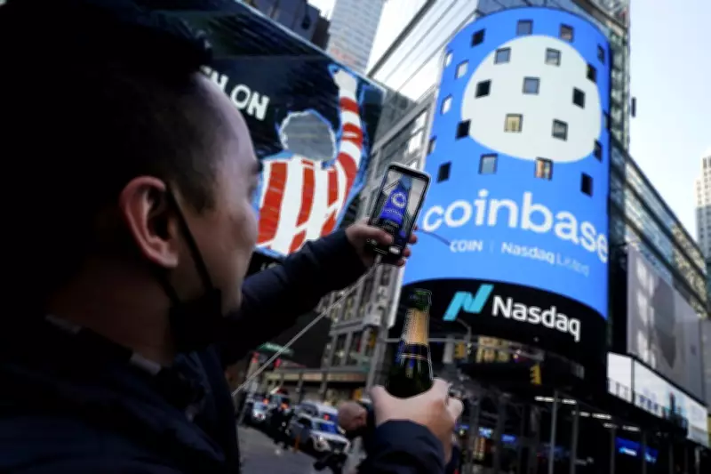 Coinbase to cut about 14% of workforce amid crypto downturn