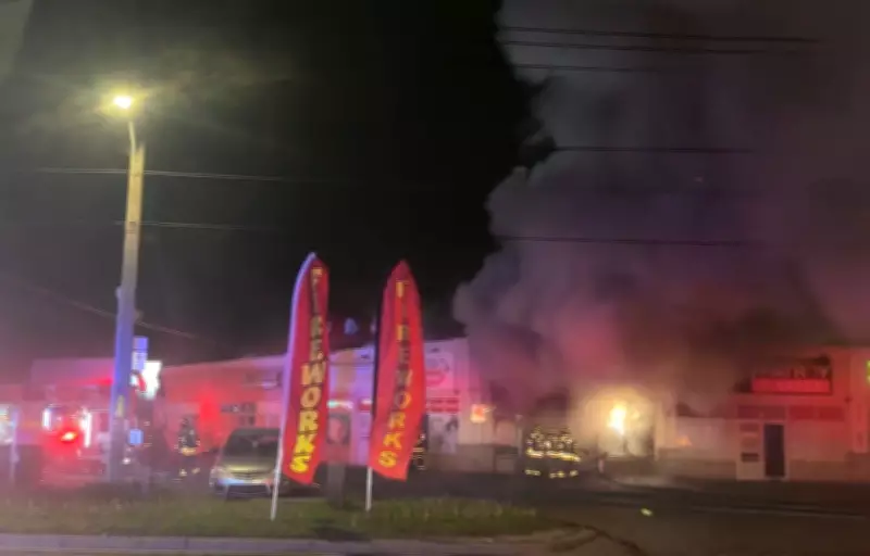 Driver Sought After Car Crashes into Fireworks Store, Igniting Massive Blaze in Etobicoke