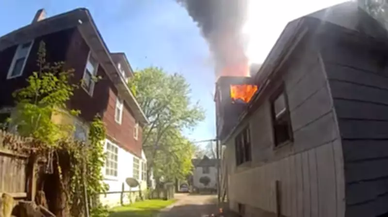 Michigan Officer Rescues Baby Thrown from Burning Home Window