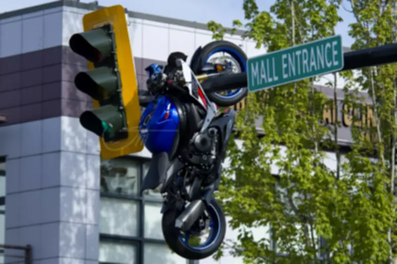 Motorcycle Crash in Delta Leaves Bike Hanging from Traffic Light