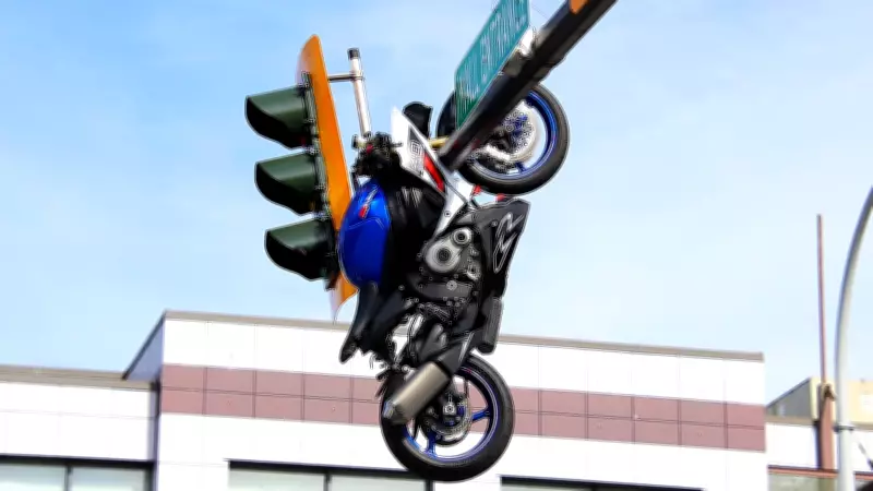Motorcycle Hangs from Traffic Light Pole After Crash in Delta, B.C.
