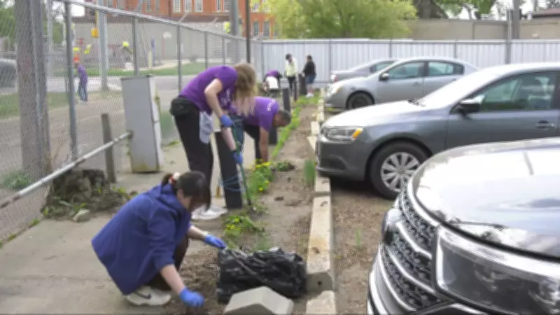 Volunteers spruce up outdoor space for Edmonton seniors on Day of Giving