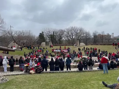 Dozens of Manitobans March for Change on Red Dress Day at The Forks