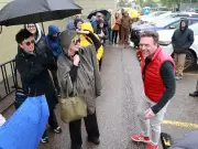 Calgarians brave rain for Forever Canadian lawn sign event