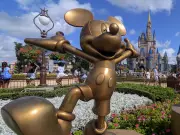 Canadian tourist charged with battery after shoulder checking Disney worker