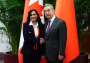 China's Foreign Minister: A Deep Background in EVs, Energy, and Opera Diplomacy