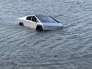 Cybertruck Owner Charged After Driving Into Texas Lake Using 'Wade Mode'