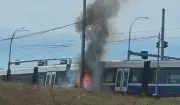 Fiery Crash Between Vehicle and LRT Closes Roads Near Whitemud Drive