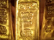 Gold Drops as Fed's Waller Warns Next Rate Move Likely a Hike