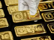 Gold Falls as US Inflation Data Dims Hopes for Fed Rate Cuts