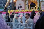 Iran Stages Mass Weddings for Couples Ready for War 'Sacrifice'
