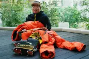 Japanese woman first to scale world's 14 highest peaks, aims to share joy