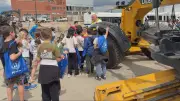 Regina Students Explore Heavy Equipment at Public Works Day