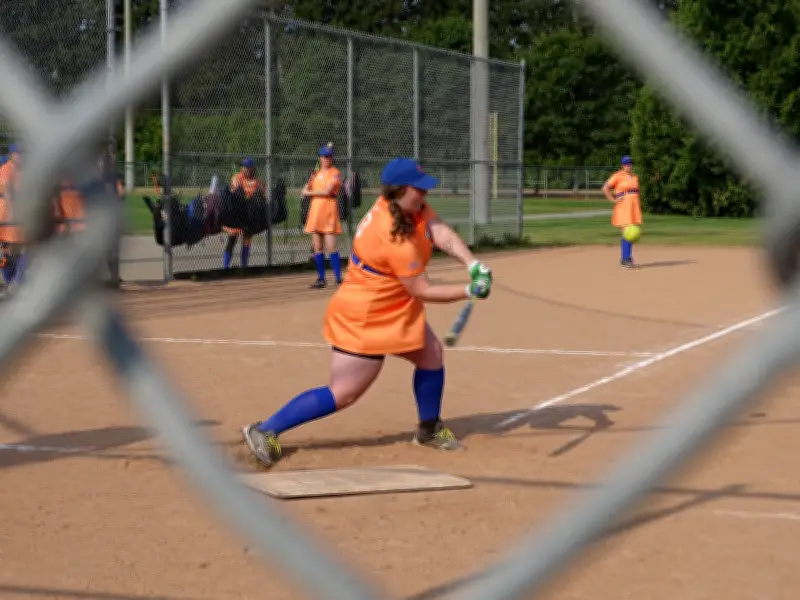 Dirt in the Skirt Slo-Pitch League: First Season with Mandatory Dresses for 98 Athletes