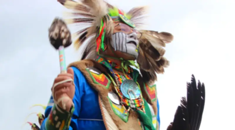 Indian Relay Announcer Gayle Skunk Cap Talks Calgary Stampede Qualifiers