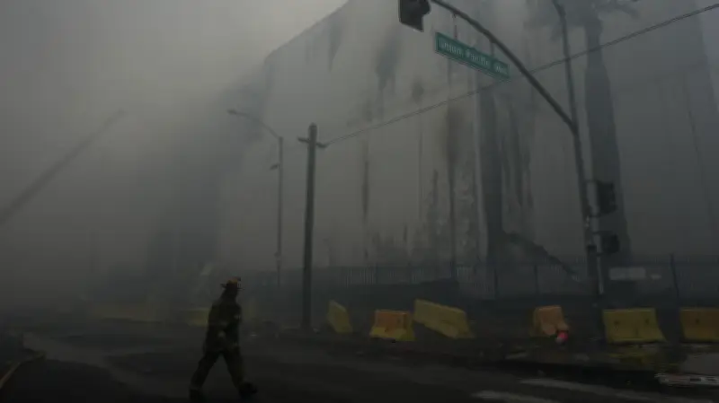 Los Angeles Firefighters Battle Frozen Food Warehouse Blaze for Sixth Day