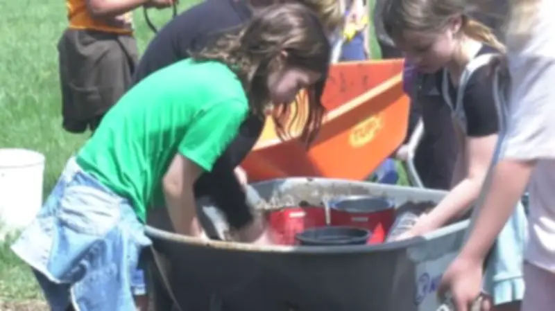 Regina students help plant trees at Kinsmen Park