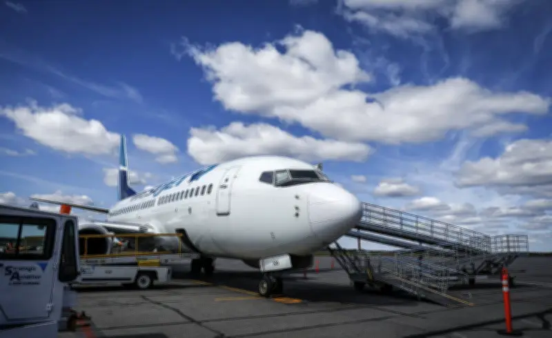 Some airlines cut fuel surcharges as oil prices drop, others hold steady
