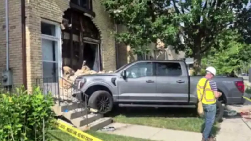 Two-Vehicle Crash Sends Pickup Truck into South London Home