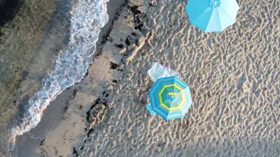 Italian Beach Bans Umbrellas for Ages 10-65: New Rules Spark Debate
