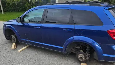 Vehicle Propped on Blocks After All Four Tires Stolen in Cochrane