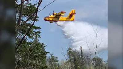 Water Bombers, Helicopters, Sprinklers Battle Two Manitoba Wildfires