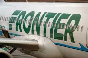 Frontier Passenger Chokes Off-Duty Flight Attendant After Trying to Open Exit Door and Cockpit on Chicago Flight