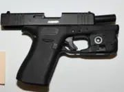 Loaded Gun, Cocaine Seized in Regent Park Traffic Stop; Two Charged