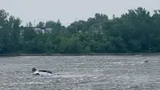Montreal Residents Worried About Car Wreckage Stuck in Mille Îles River for Months