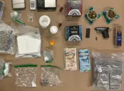 North York Man Faces Gun and Drug Charges After Police Seize Cash and Weapons