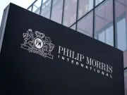 Philip Morris Cuts Profit Outlook After $500M Canada Writedown