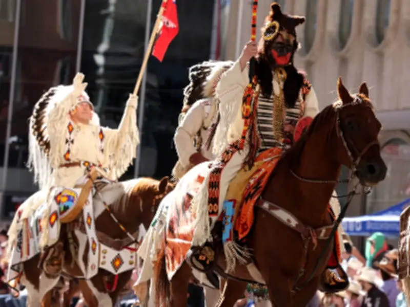 Calgary Stampede Parade Shines Despite Early Summer Weather Woes