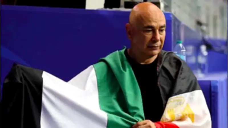 Egypt Coach Hossam Hassan Waves Palestinian Flag After World Cup Win