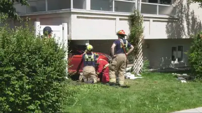 Investigation after Vehicle Crashes into NW Calgary Home